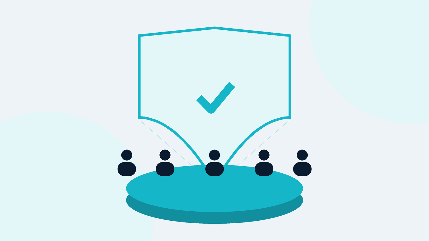 A nonprofit board seated around a table under a protective shield
